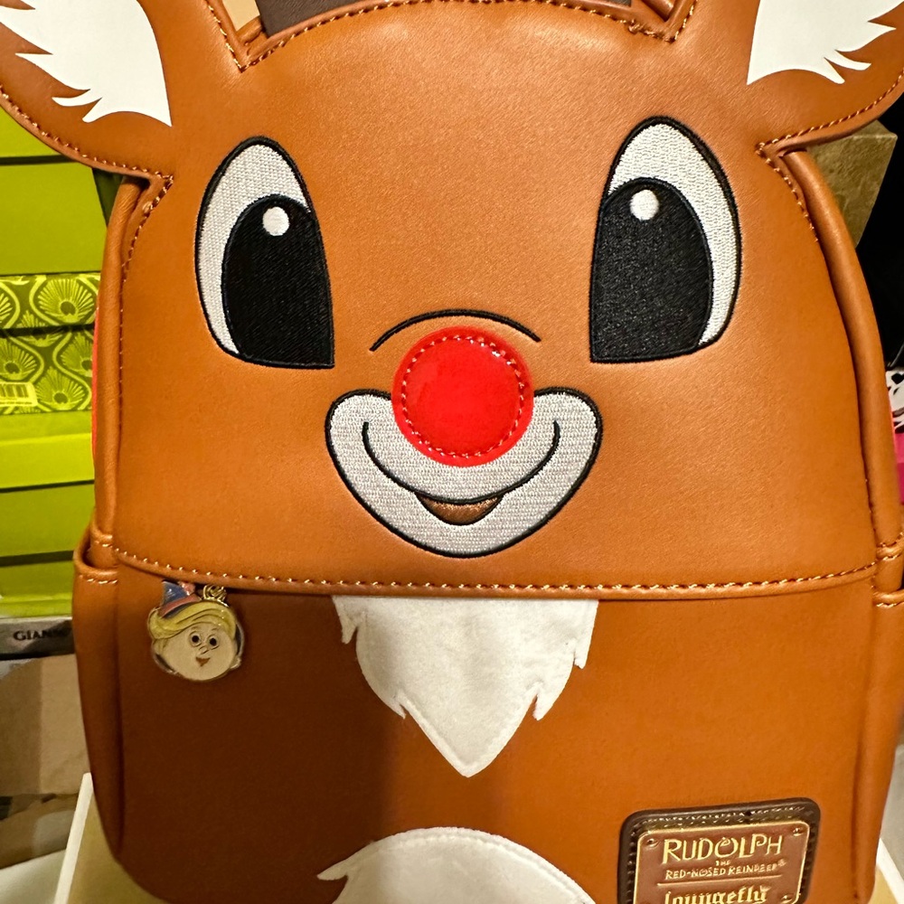Loungefly Rudolph backpack and matching wallet. NEW
